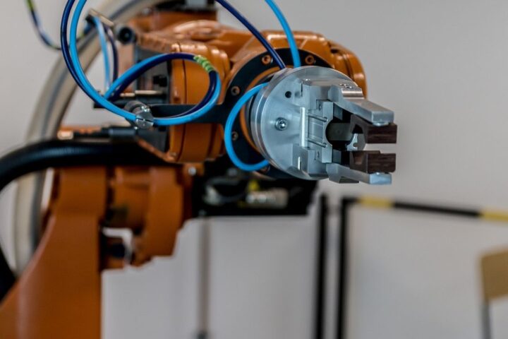 Industrial robot arm with a gripper