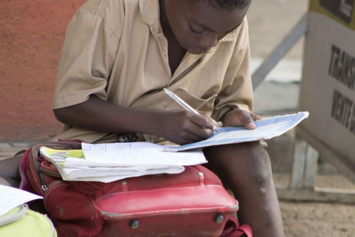 Child doing homework at a table