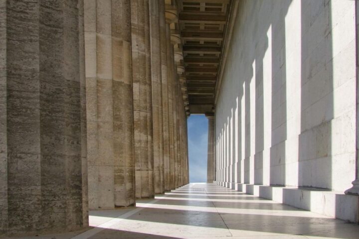 Long colonnade of tall stone pillars