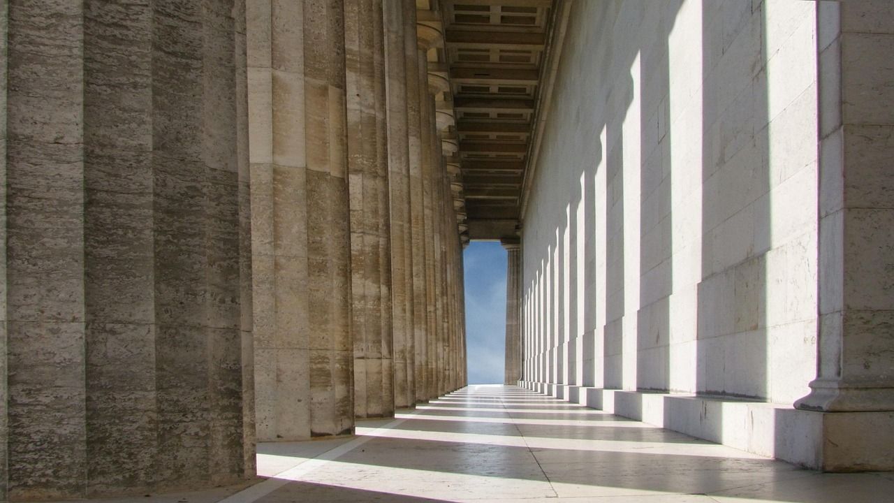 Long colonnade of tall stone pillars