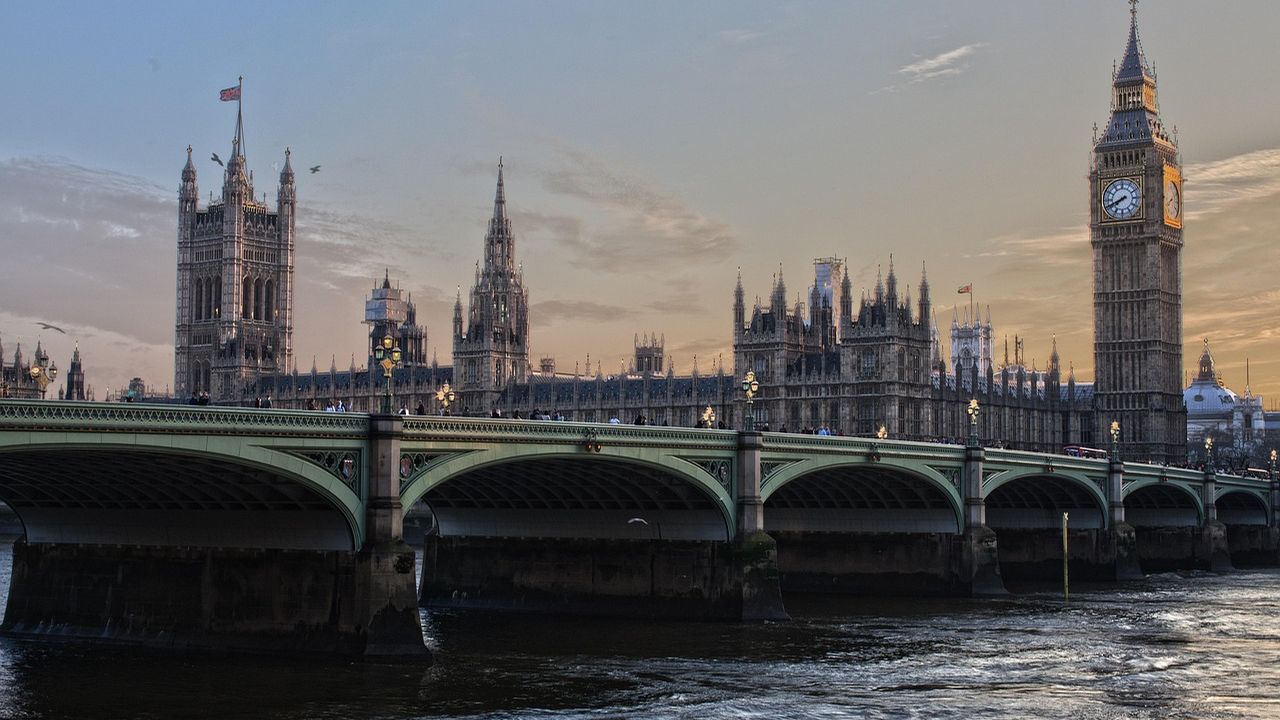 Houses of Parliament and Westminster Bridge on the River Thames at dusk