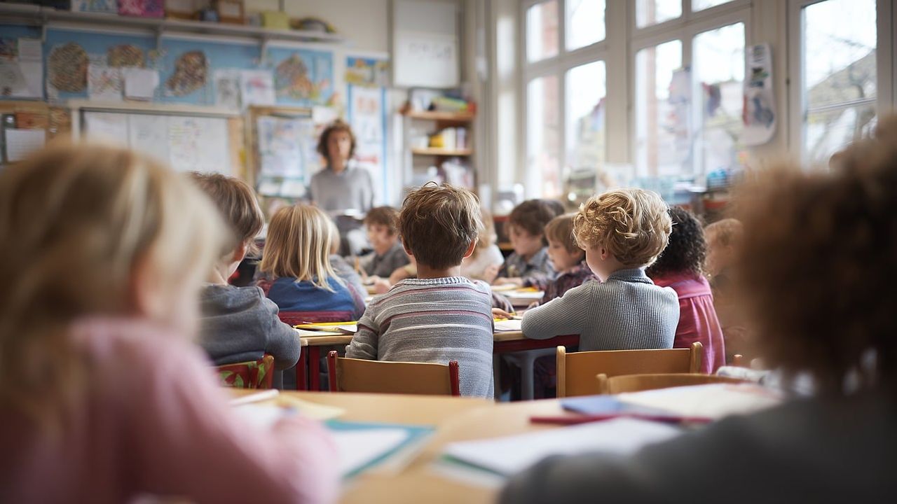 Primary school classroom with children at desks