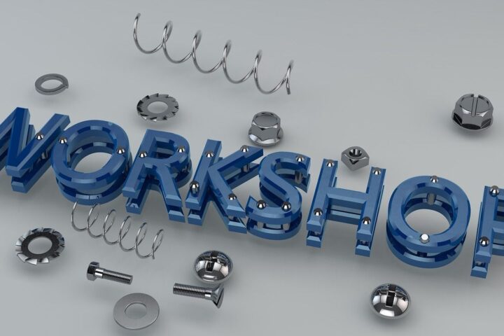 3D lettering spelling Workshop surrounded by nuts and bolts