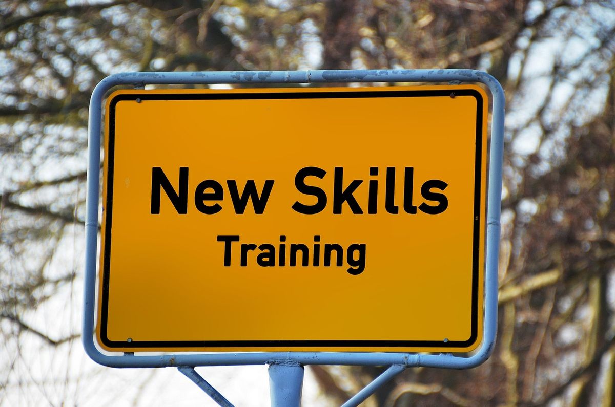Road sign reading New Skills Training