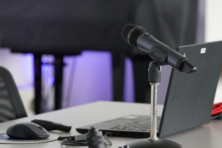 Microphone set up in front of a laptop for recording