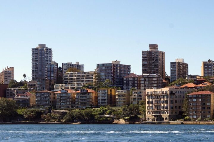 Sydney apartment towers along the harbour shoreline