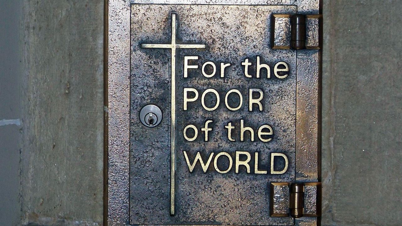 Church poor box reading For the Poor of the World