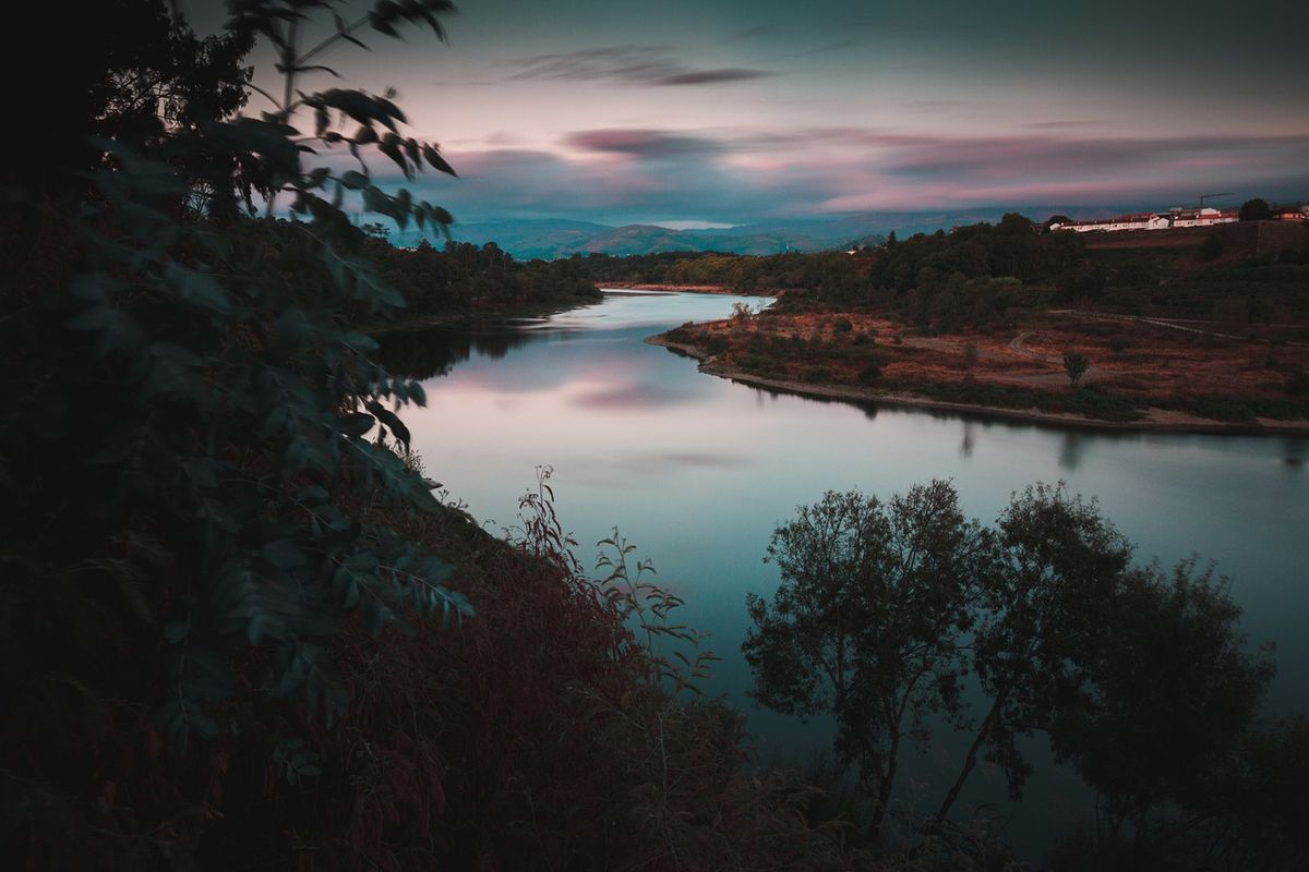River winding through hills at dusk