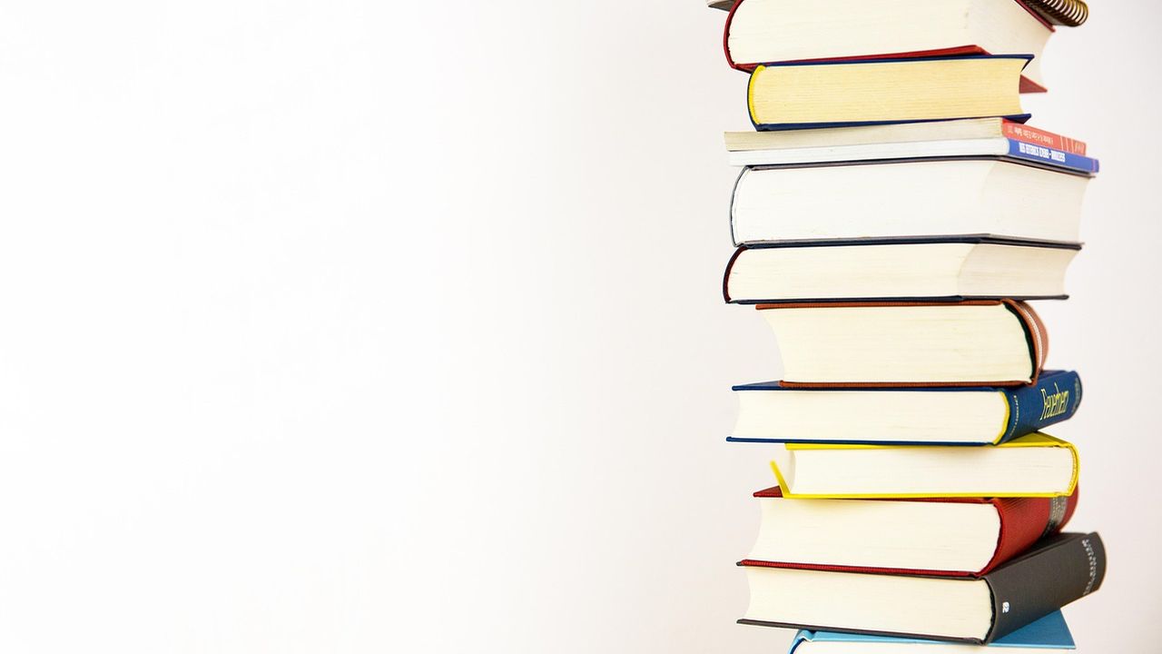 Tall stack of books