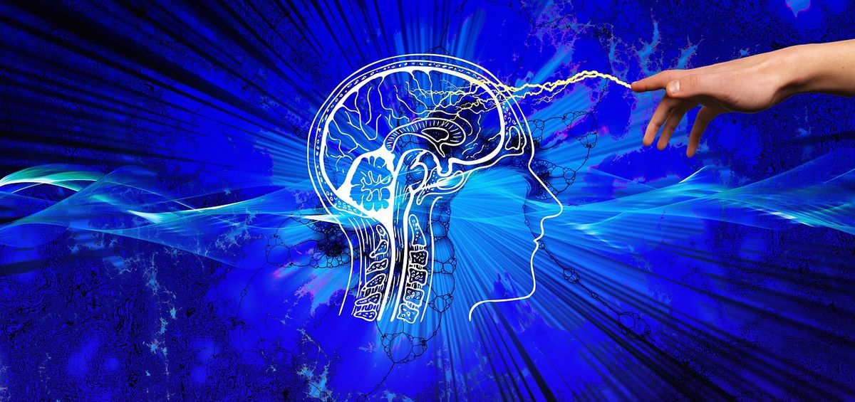 Glowing illustration of a brain being touched