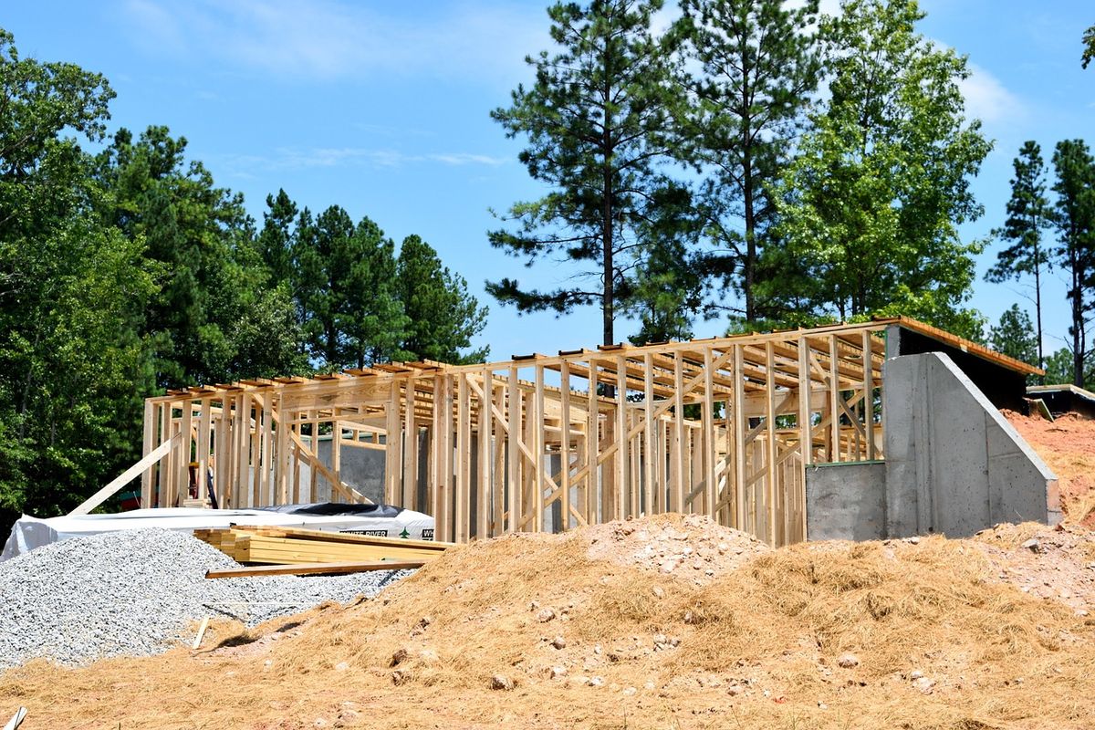 Wooden house frame on a building site