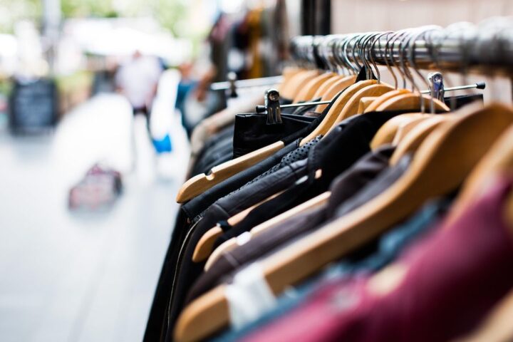 Row of clothes hanging on a shop rail