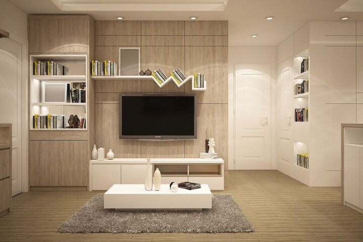 Modern living room with a wall-mounted TV and shelving