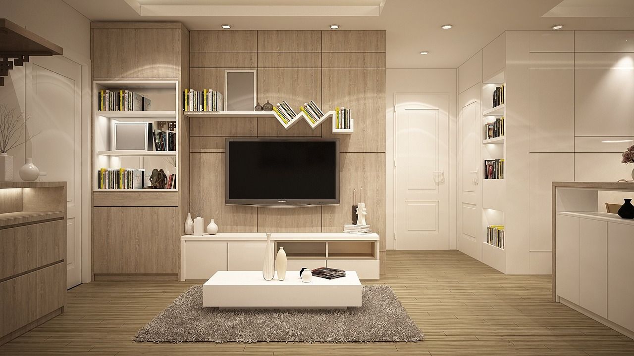Modern living room with a wall-mounted TV and shelving