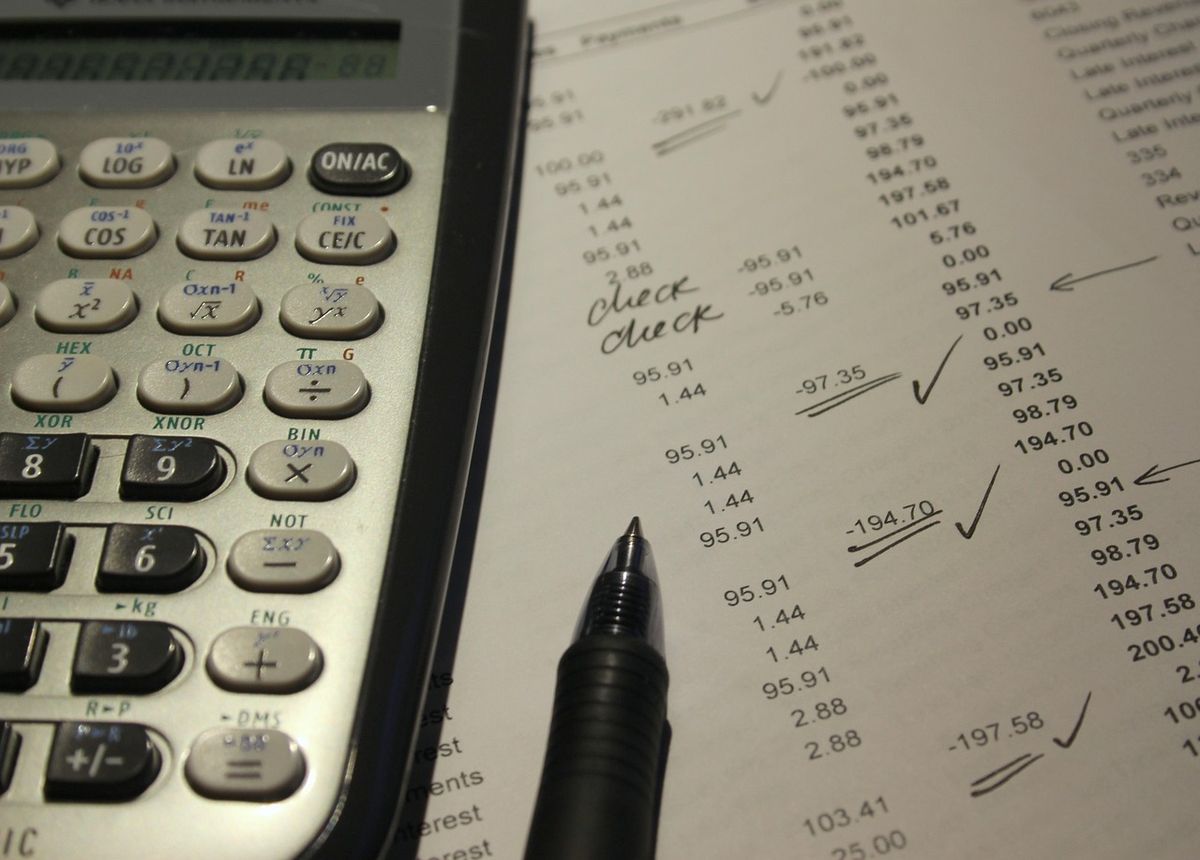 Calculator and ticked accounts ledger