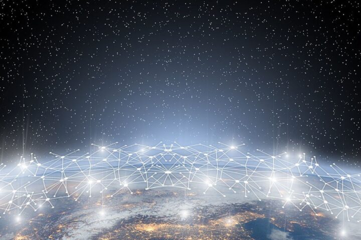 Glowing network of connected points over the curve of the Earth