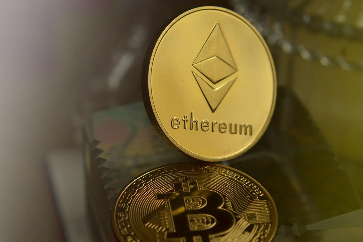 Gold ethereum coin standing upright