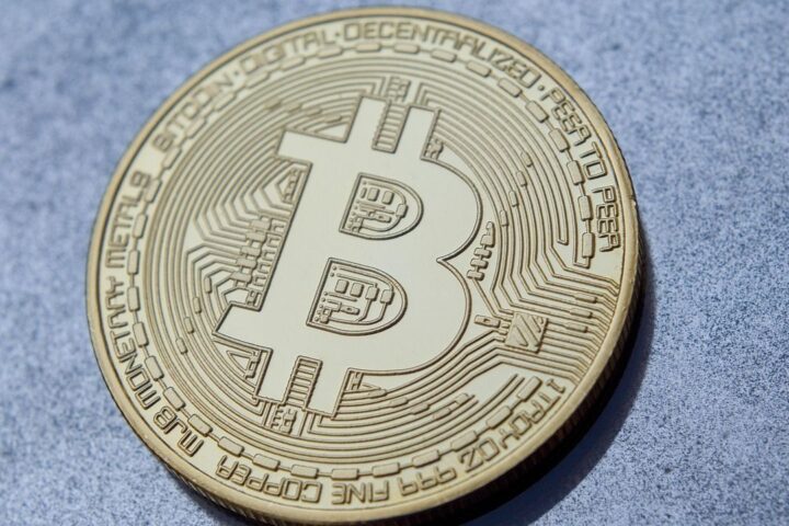 Close-up of a gold bitcoin coin