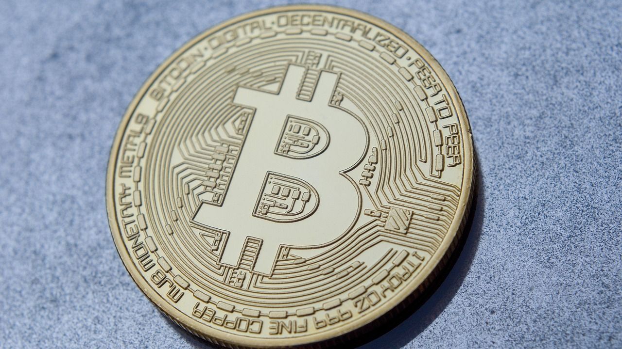 Close-up of a gold bitcoin coin
