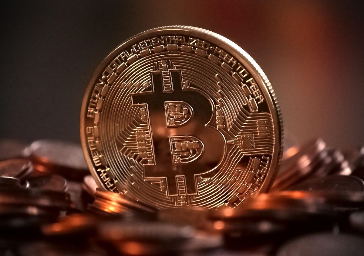 Close-up of a copper bitcoin coin