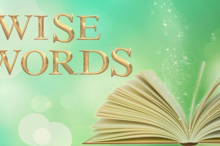 Open book with the words Wise Words above it