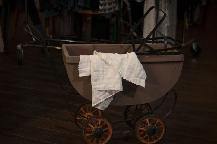 Vintage pram in a dimly lit room