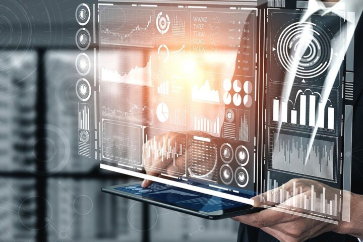 Businessman using a holographic data dashboard