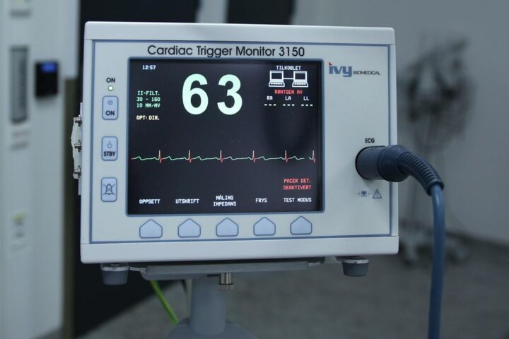 Cardiac monitor showing a heart rate of 63