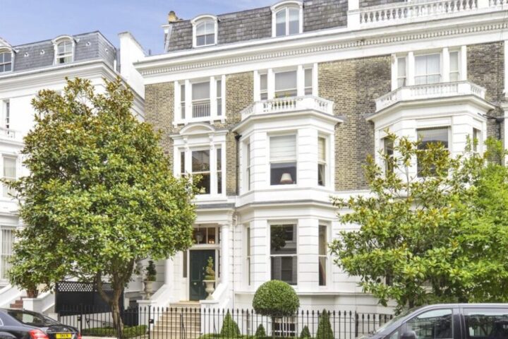 White stucco Victorian townhouses on Upper Phillimore Gardens, London
