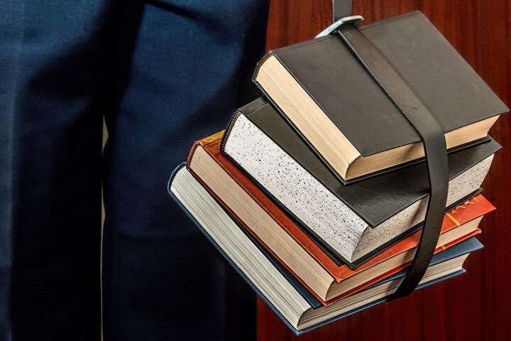 Stack of books held with a strap