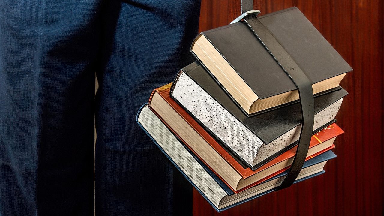 Stack of books held with a strap