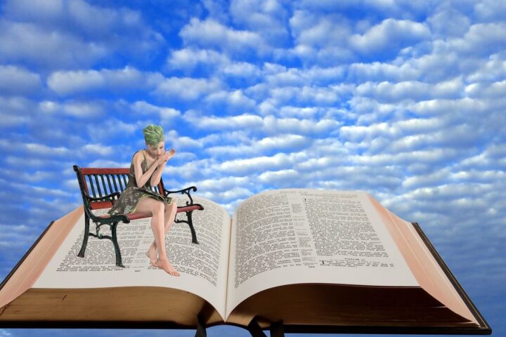 Woman on a bench sitting on a giant open book in the clouds